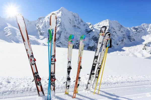 ski holiday catered chalet meribel - skis in snow